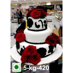 Black and White Wedding cake with red roses